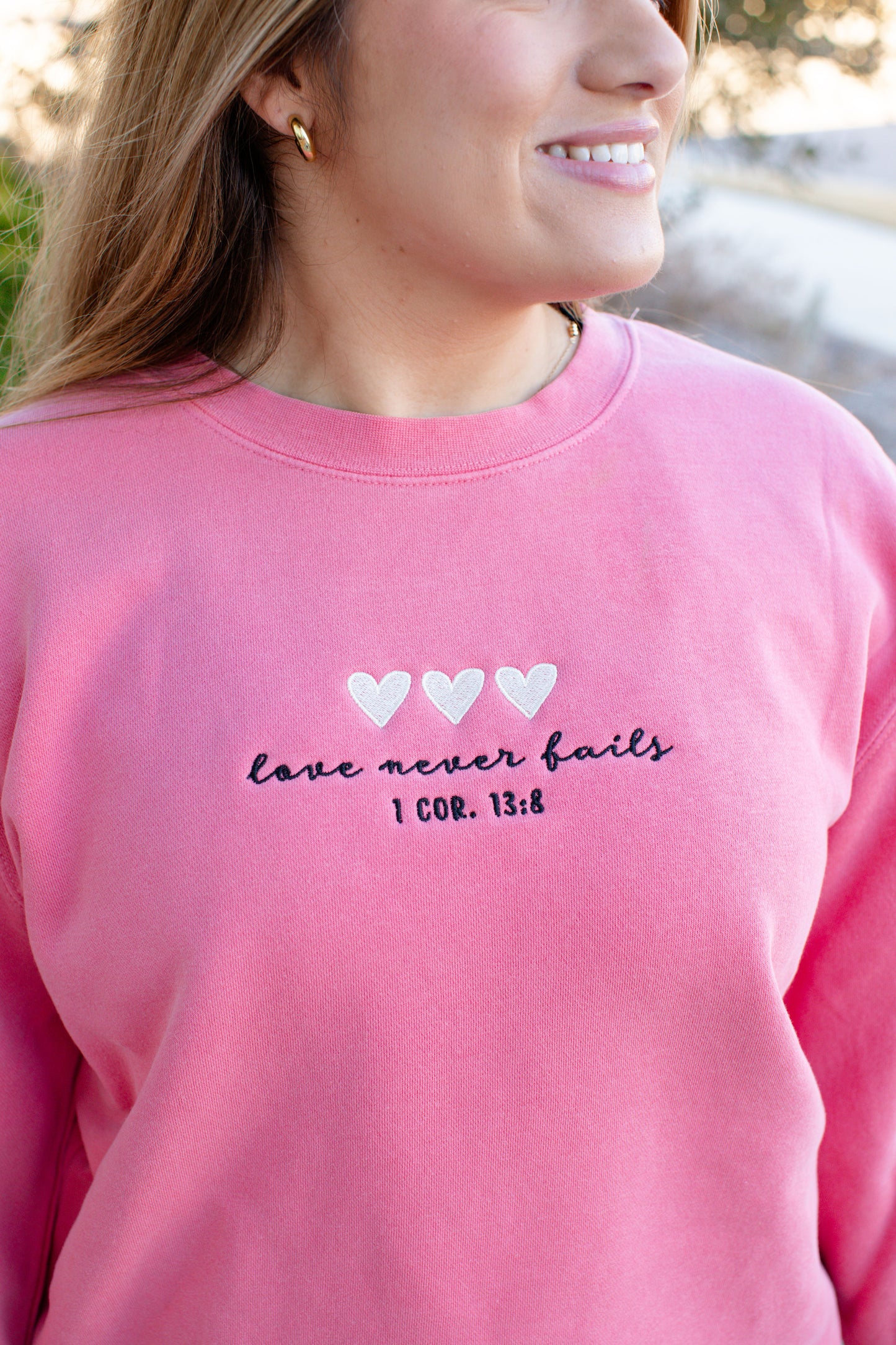 Love Never Fails Sweatshirt