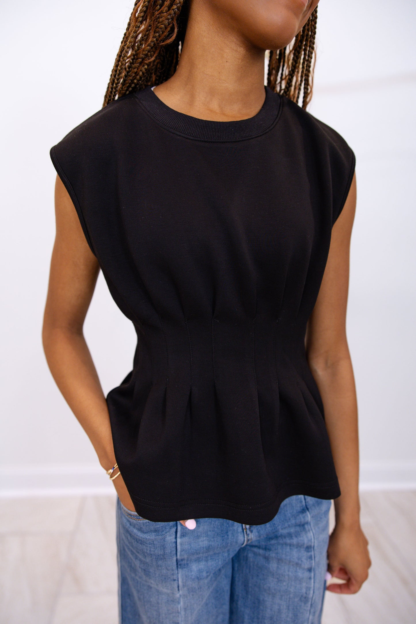 Sleeveless Top Featuring Waist Pleat Detail