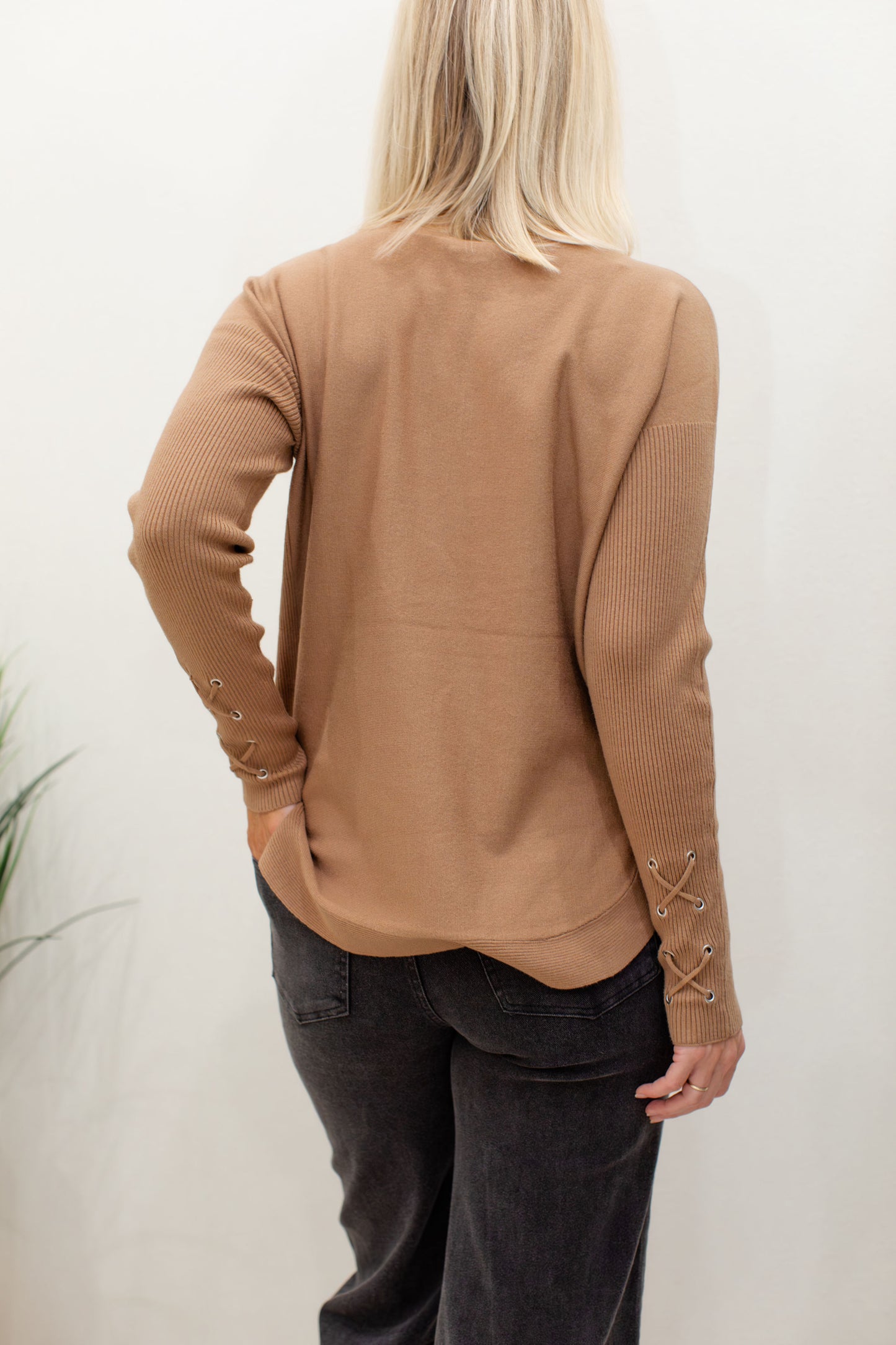 Round Hem Sweater With Front Pockets And Sleeve lacing Detail